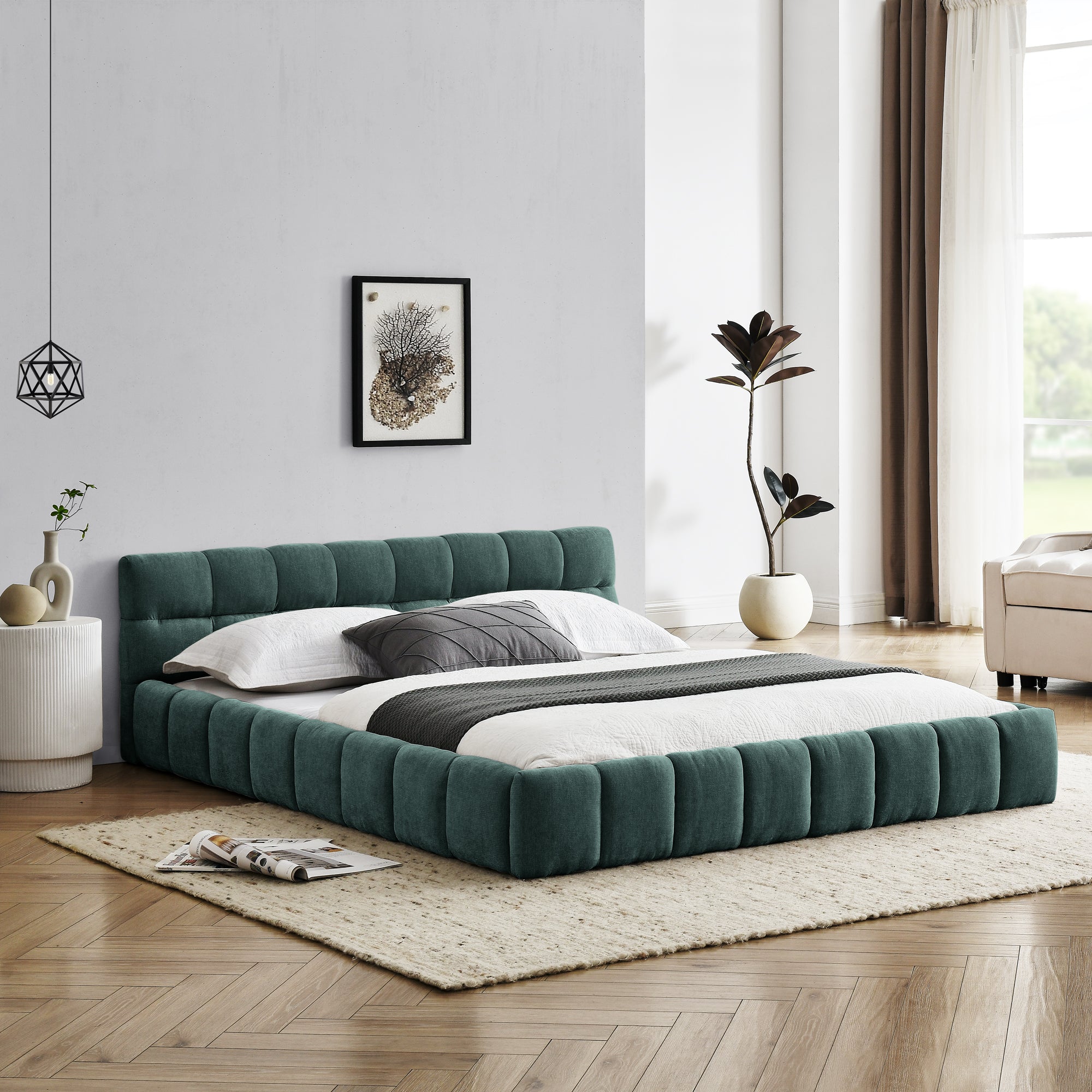 Large soft-padded bed frame in blue-green color
