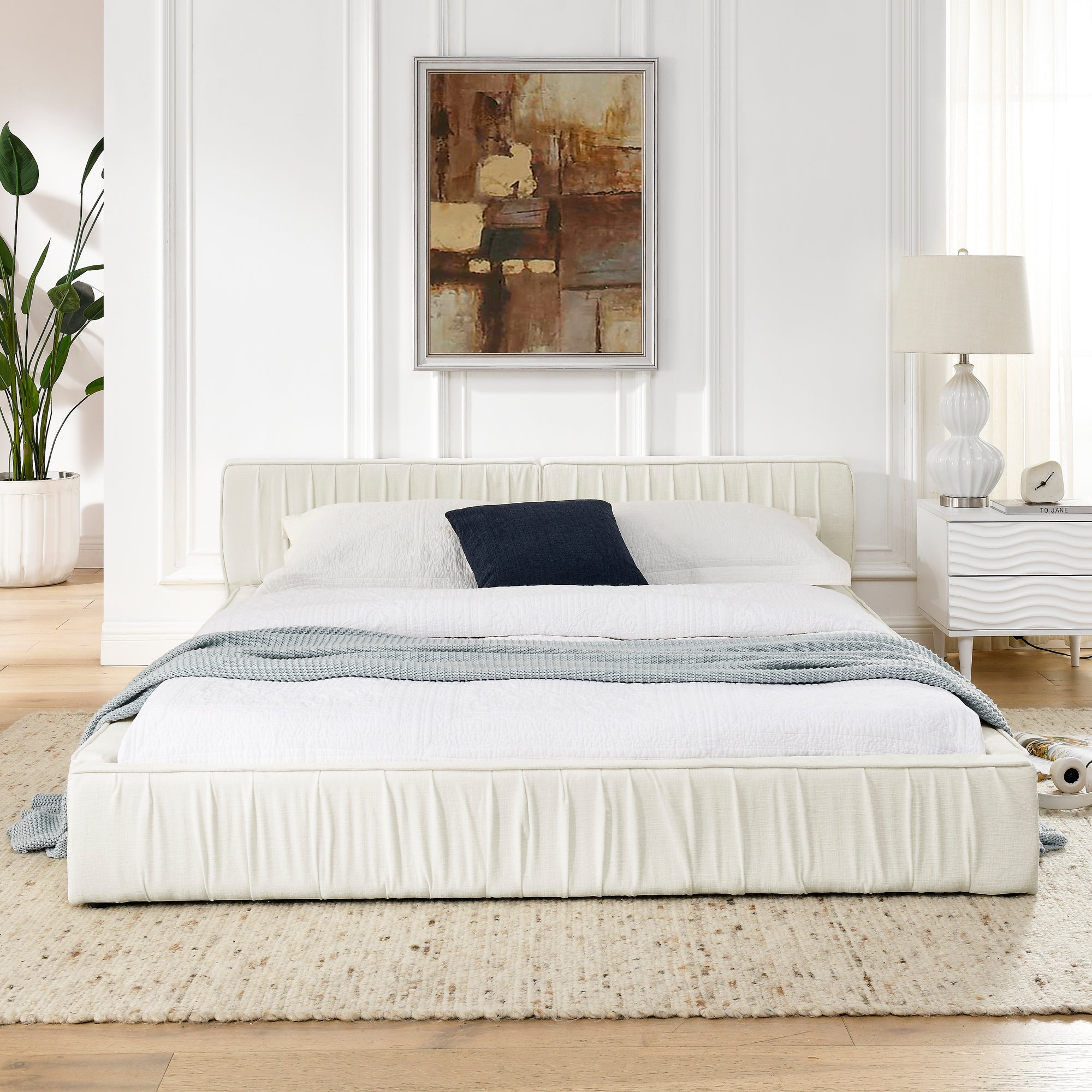 Beige large soft-padded platform bed frame