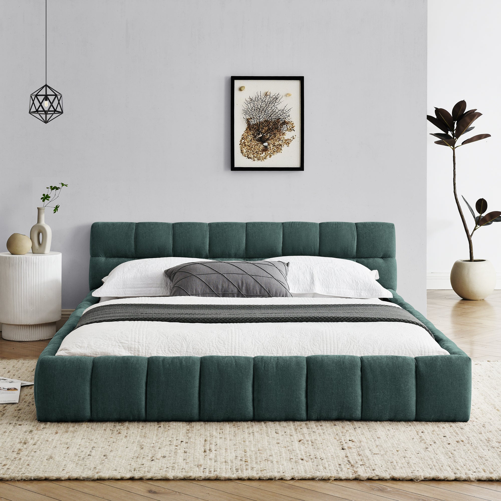 Large soft-padded bed frame in blue-green color
