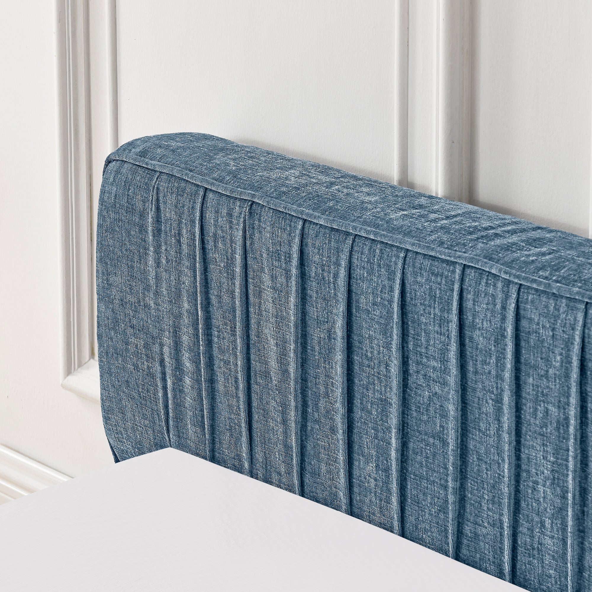 Large blue soft-padded bed frame