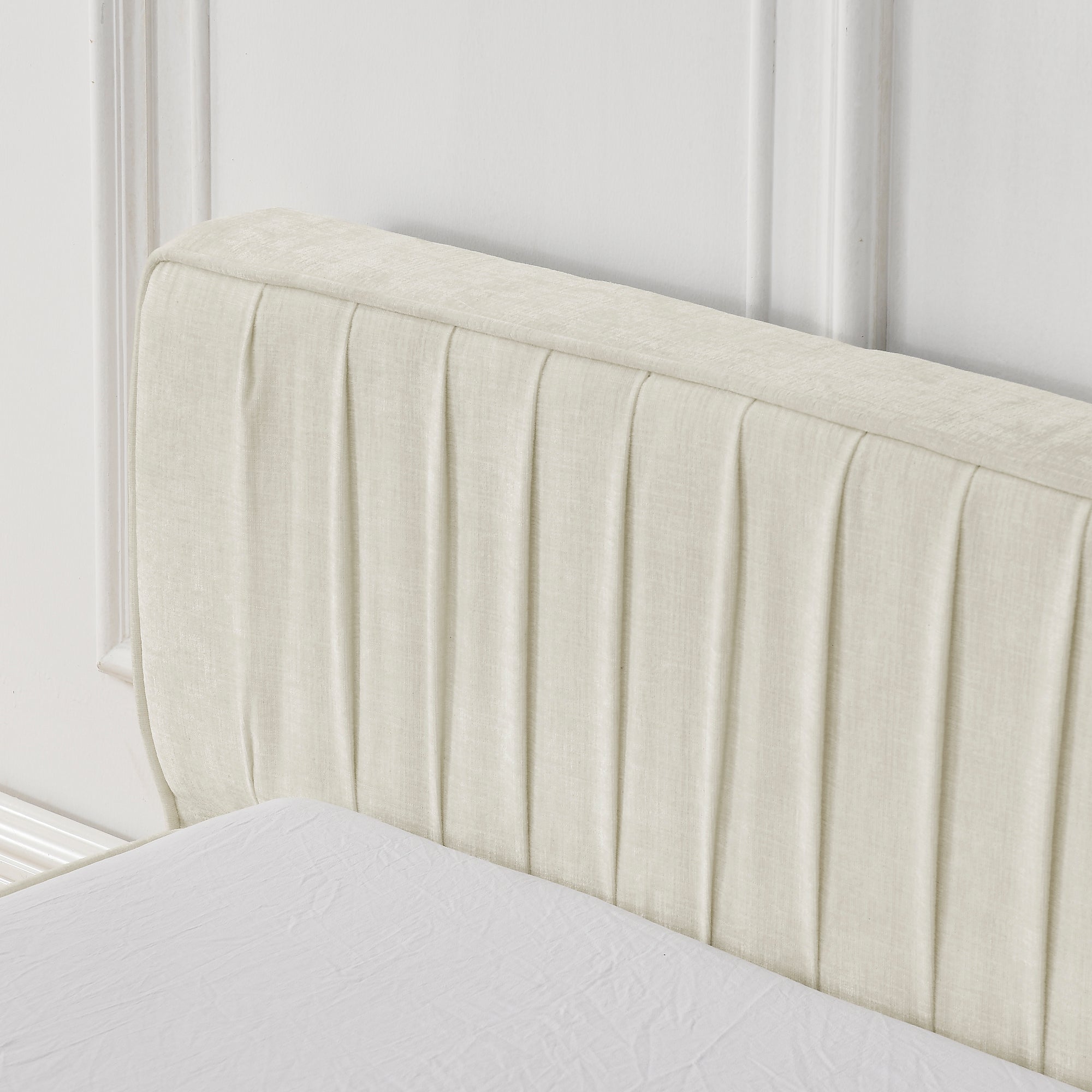 Beige large soft-padded platform bed frame