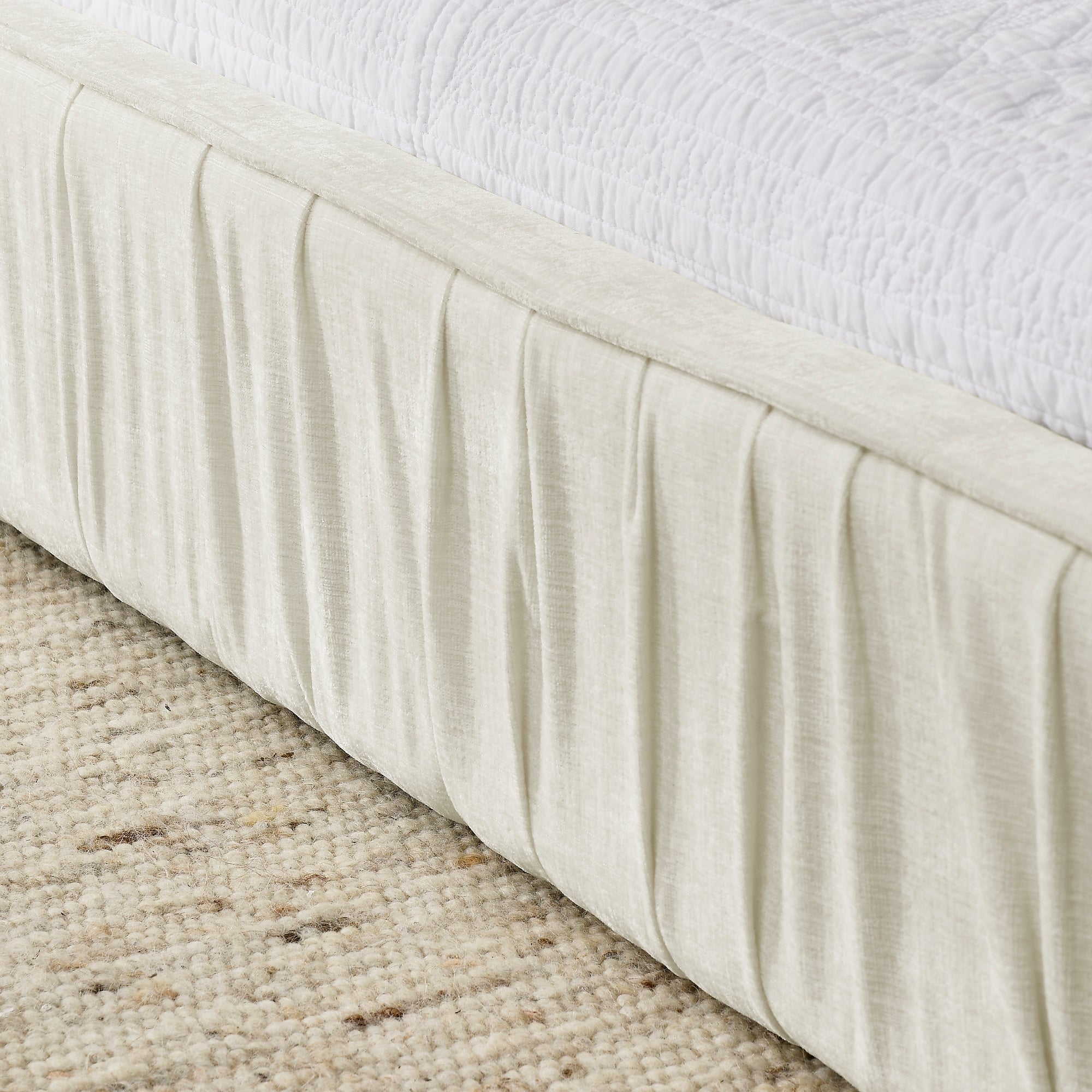 Beige large soft-padded platform bed frame