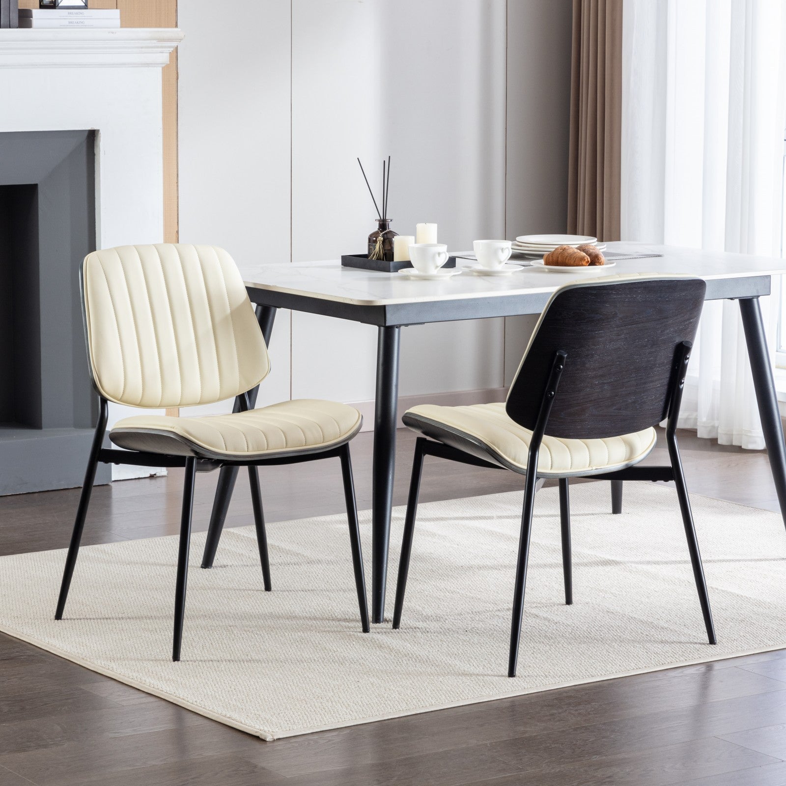 Two modern retro dining chairs from the Middle century