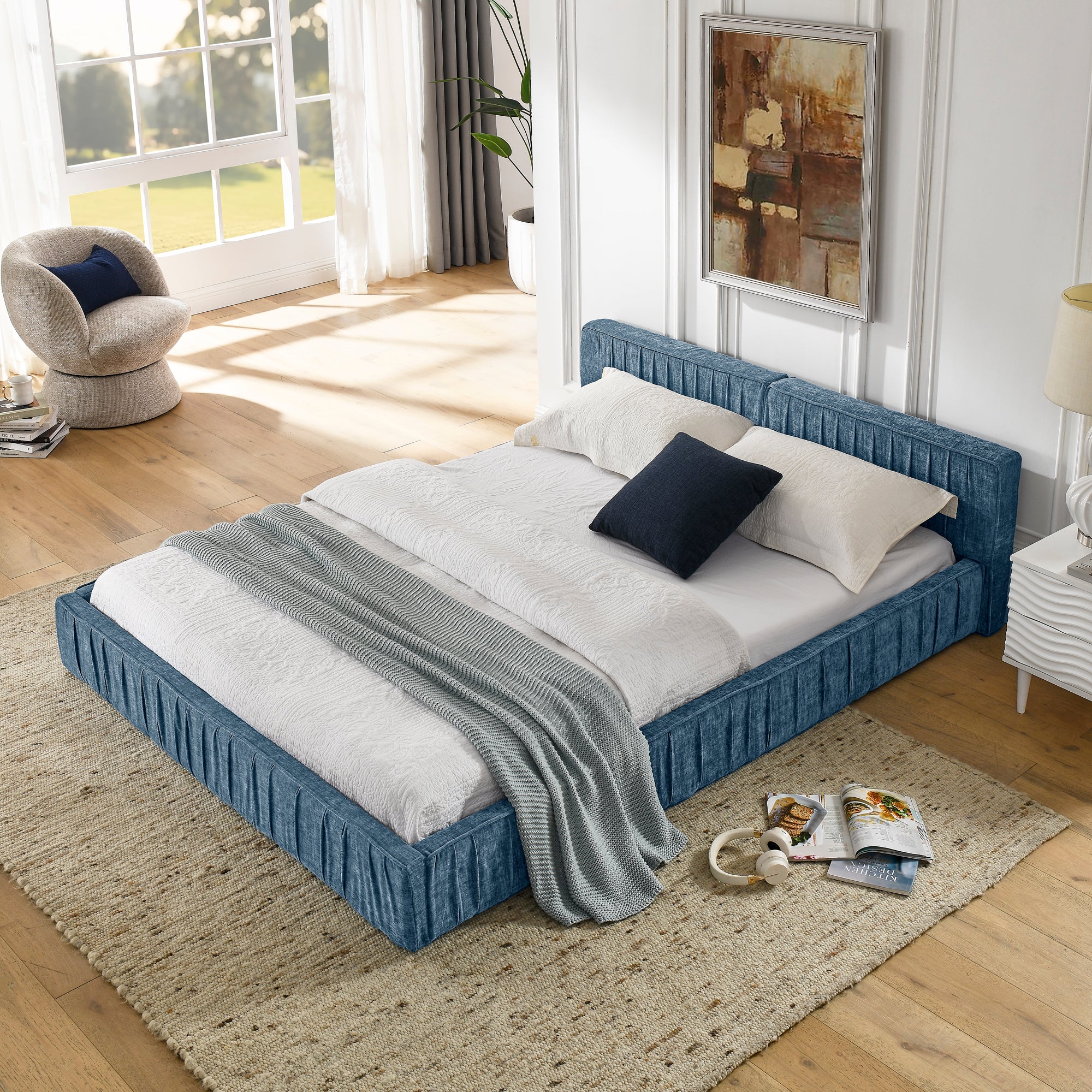 Large blue soft-padded bed frame