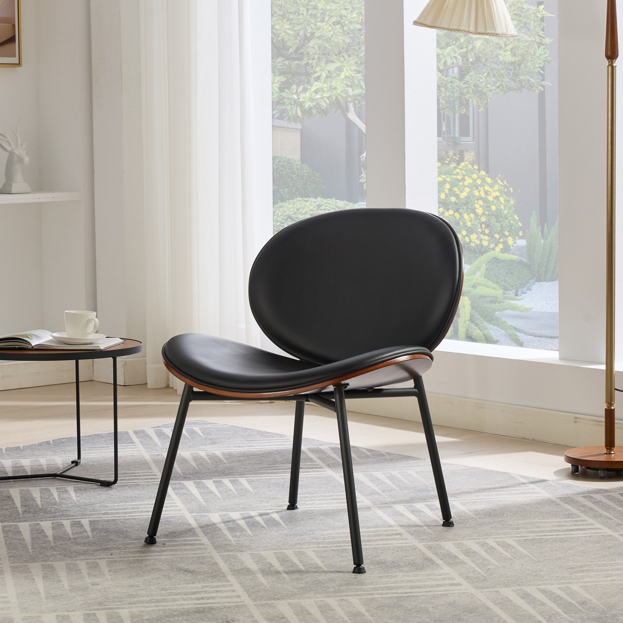 Walnut wood veneer tripod black leather lounge chair