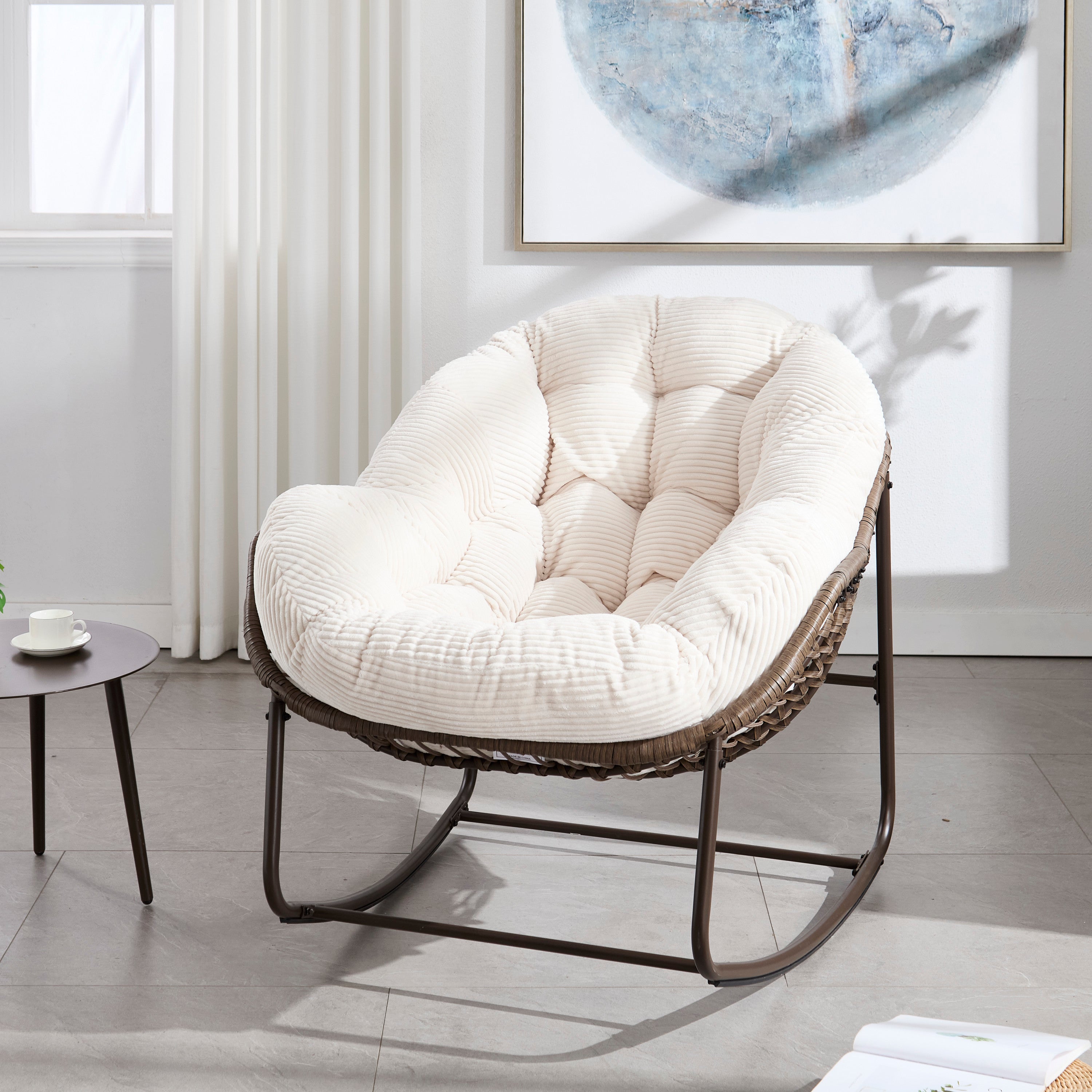 White outdoor soft-padded rattan rocking chair and lounge chair